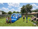 32ft Double Lane Slip and Slide rental in Houston with dual racing lanes — ideal for Spring parties.