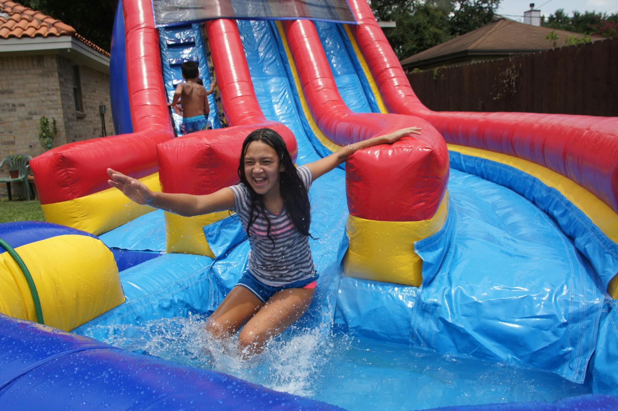 7 Water Slides That Will Turn Your Backyard Into A Water Park