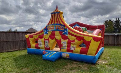 Circus Toddler Bounce House Rental on Grass