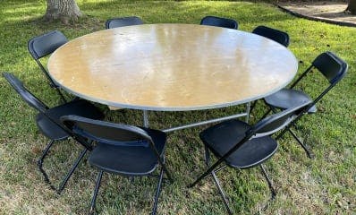 Round Tables and Black Chairs for rent