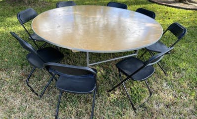 Round Banquet Tables and Black Chairs
