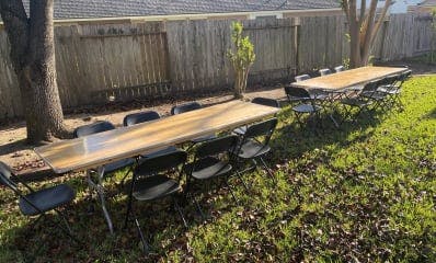 8ft banquet tables and black chairs for rent
