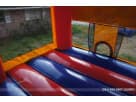 Paw Patrol bounce house rental in Houston with colorful red, blue, and orange panels, holds up to 6 kids, ideal for Sugar Land