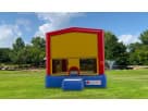 Red and yellow 15x15 bounce house rental in Houston, ideal for kids ages 3 and up at park parties in The Woodlands.