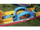 Interactive obstacle course rental in Houston with colorful blue arches and yellow tunnels, ideal for kids' parties in Pearland.