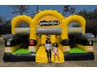 Children in front of Adrenaline toxic Obstacle Course Bounce house