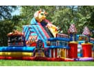 Wild animal-themed obstacle course rental in Houston with dual slides and climbing wall, ideal for Cypress birthday parties