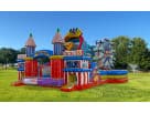 Carnival-themed amusement park obstacle course rental in Houston with rock wall and slides, ideal for Cypress birthday parties.