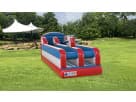 Red and blue bungee run rental in Houston with padded obstacles, ideal for teen and adult competitions in Katy.