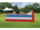 Red and white dual-lane bungee run rental in Houston, ideal for competitive teenage and adult parties in Spring.