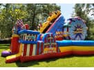 Large carnival-themed obstacle course rental in Houston with rock wall and slides, ideal for League City birthday parties