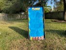 Plinko carnival game rental in Houston backyard with colorful game pieces, ideal for Cypress birthday parties and events.