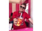 Child enjoying a colorful beverage at a Carnival Treat Shop rental in Houston, featuring dual serving windows ideal for event
