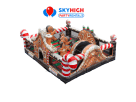 Gingerbread Wonder Playland bounce house rental in Houston with popup structures and slide, perfect for Sugar Land holiday events.