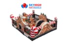 Gingerbread Wonder Playland bounce house rental in Houston with popup structures and slide, perfect for Sugar Land holiday events.