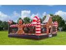 Gingerbread Wonder Playland bounce house rental in Houston with candy cane details and slide, ideal for Spring holiday parties.