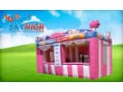 Pink and white striped Carnival Treat Shop rental in Houston with dual serving windows, ideal for Kingwood events and parties.