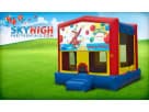 Curious George bounce house rental in Houston with 15x15 moonwalk — ideal for Spring birthday parties.