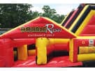 Perfect for Cypress birthday parties, this red and yellow Double Rush obstacle course rental in Houston features dual lane slides