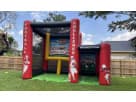 Football Challenge interactive bounce house rental in Houston with dual games, ideal for Sports-themed parties in Sugar Land.