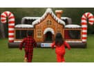 Gingerbread Wonder Playland bounce house rental in Houston with candy cane details and slide, ideal for Pearland holiday parties.