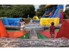 Colorful interactive obstacle course rental in Houston with climbing walls and slide elements, ideal for The Woodlands birthday