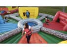 Perfect for Spring birthday parties, this interactive obstacle course rental in Houston features climbing walls and log barriers