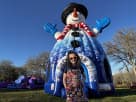 Snowman bounce house rental in Houston with red scarf details, ideal for Spring Christmas parties and toddler entertainment.