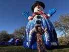 Snowman bounce house rental in Houston with red scarf detail, perfect for Sugar Land holiday parties and winter events.