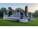 King of the Moon Walk Space Adventure inflatable obstacle course rental in Houston with dual climbing towers, ideal for kids'