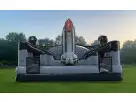 Space shuttle bounce house rental in Houston with dual slide exits, ideal for kids' birthday parties in Cypress.