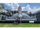 Space Adventure rocket bounce house rental in Houston, perfect for kids' birthday parties in Conroe with adjustable air flaps.