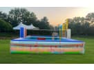 Colorful interactive lawn games rental in Houston with Giant Splash Pong and Cornhole — ideal for Sugar Land parties.