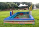 Colorful interactive mini golf game rental in Houston with putting green and tower obstacle, ideal for Spring events and family