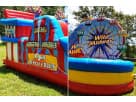 Carnival-themed obstacle course rental in Houston with rock wall, ideal for Conroe birthday parties and fundraisers.