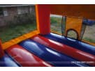 15x15 modular bounce house rental in Houston with red, blue, and orange panels—ideal for Sugar Land birthday parties and events.