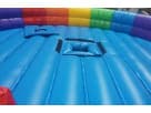 Mechanical rainbow shark interactive sports inflatable rental in Houston with bucking action, ideal for Pasadena party rentals.