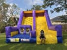 Inflatable Rockwall with Slide Rentals