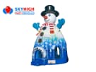 Snowman-themed bounce house rental in Houston with castle design, ideal for Christmas parties in Sugar Land.