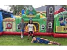 Fun Express Train Station Obstacle Course Bounce House