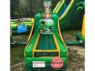 Perfect for Austin luau parties, this tropical carnival game station rental features built-in basketball hoops ideal for backyard